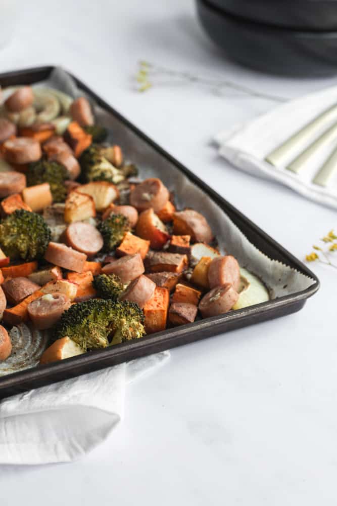 close up of the corner of of the pan with easy chicken apple sausage sheet pan supper