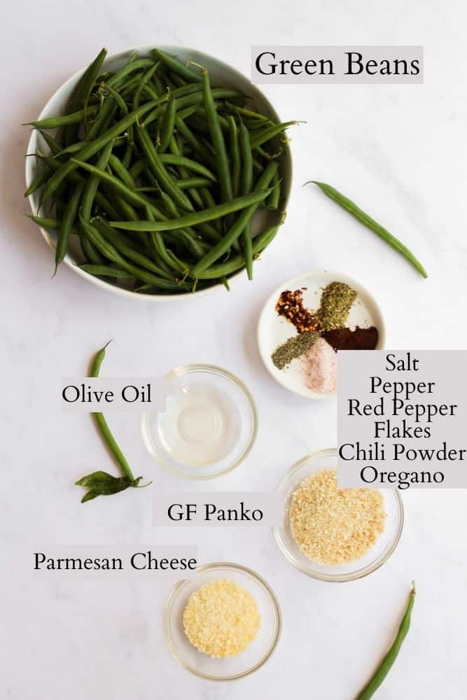  air fryer green beans ingredients on a white backdrop.
