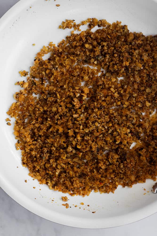 spicy breadcrumb topping in white pan.