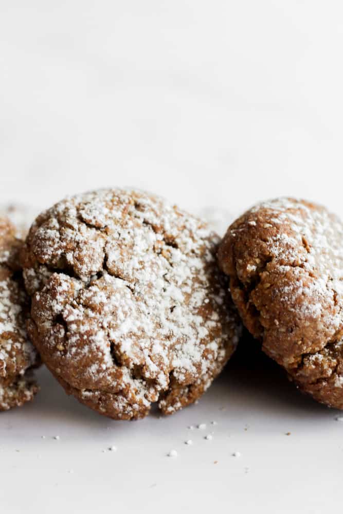 molasses crinkle cookies lined up on an angle