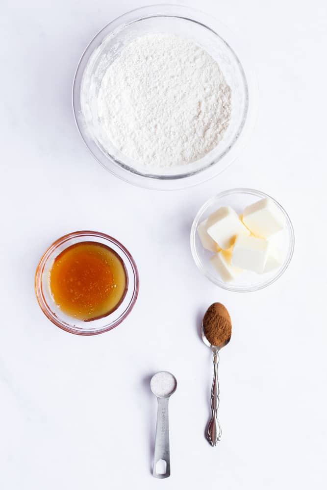easy honey shortbread ingredients on a white backdrop