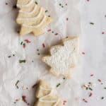 sugar free sugar cookies in the shape of christmas trees on parchment paper