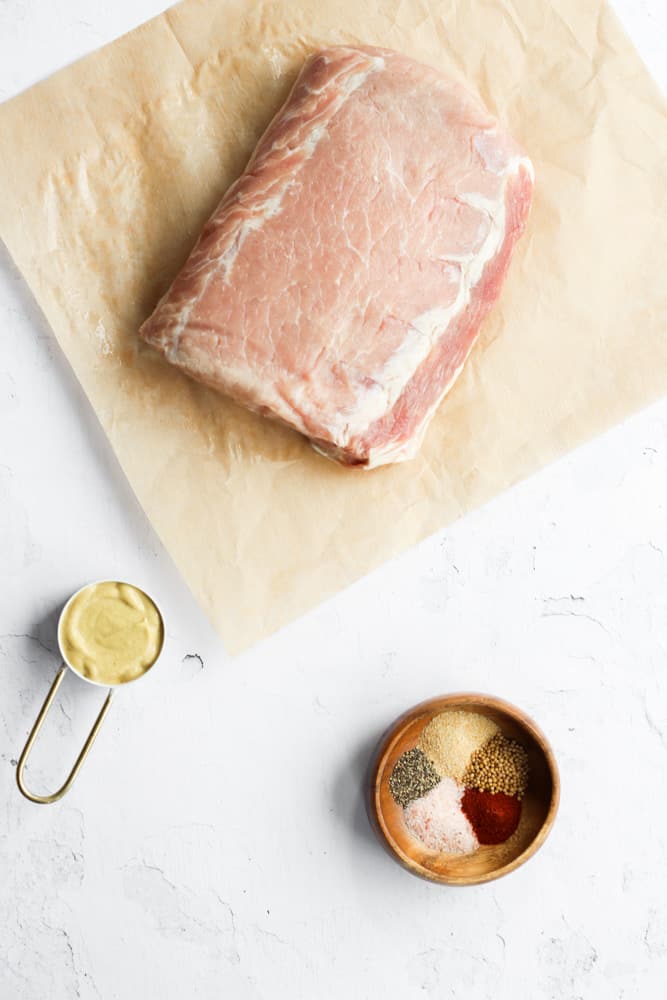 pork roast in the air fryer ingredients on a white backdrop