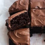 gluten free chocolate snack cake sliced with the middle piece up so you can see inside the cake.
