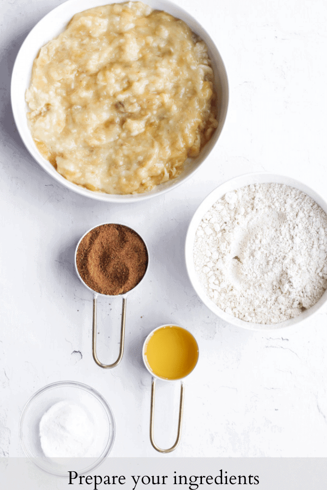 5 ingredient banana bread ingredients on a white backdrop