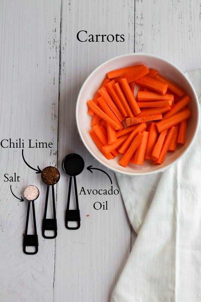 air fryer carrot fry ingredients on a white backdrop labeled with black text