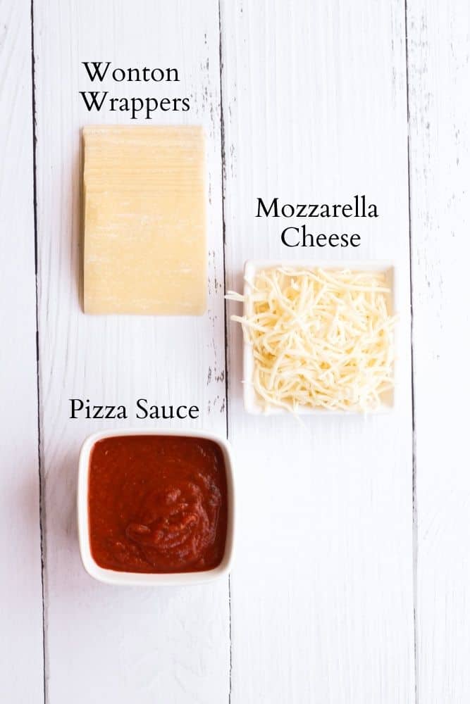 air fryer pizza roll ingredients on a white backdrop labeled with black text