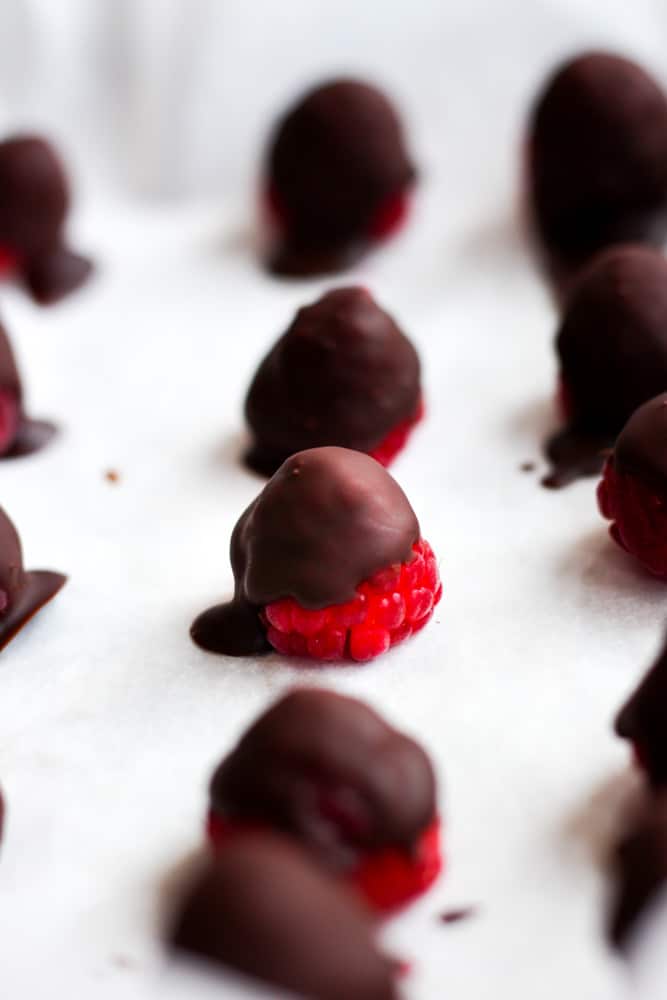 frozen raspberries coated in chocolate.