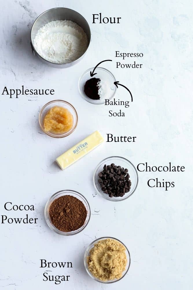 eggless chocolate cookie ingredients on a white backdrop labeled with black text.