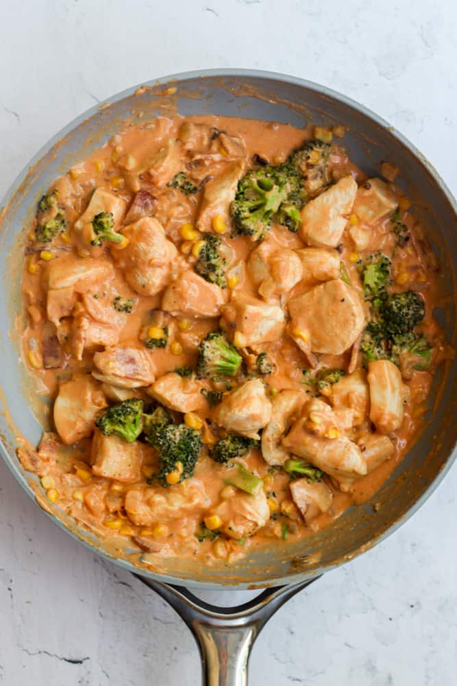 healthy chicken chipotle pasta cooked in a pan.