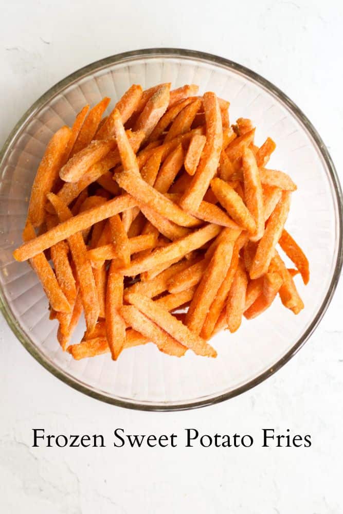 frozen sweet potato fries in a clear bowl labeled with black text.