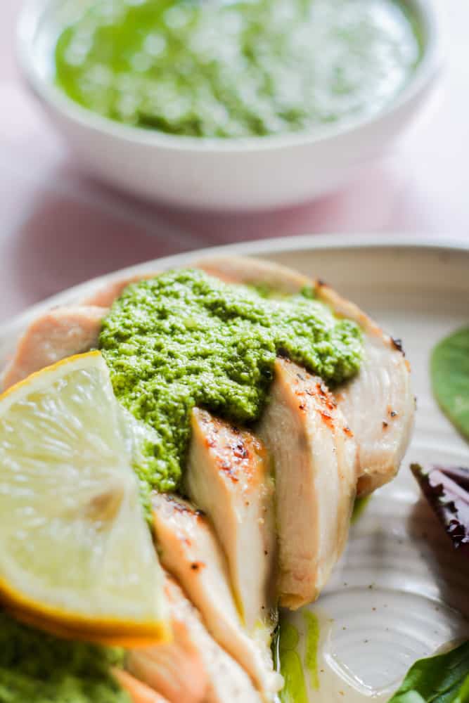 pesto without nuts on grilled chicken with a lemon.