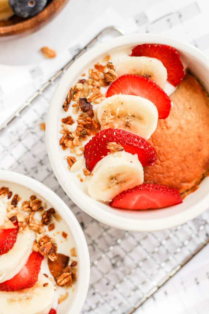 banana and strawberries on top  of healthy baked oatmeal.