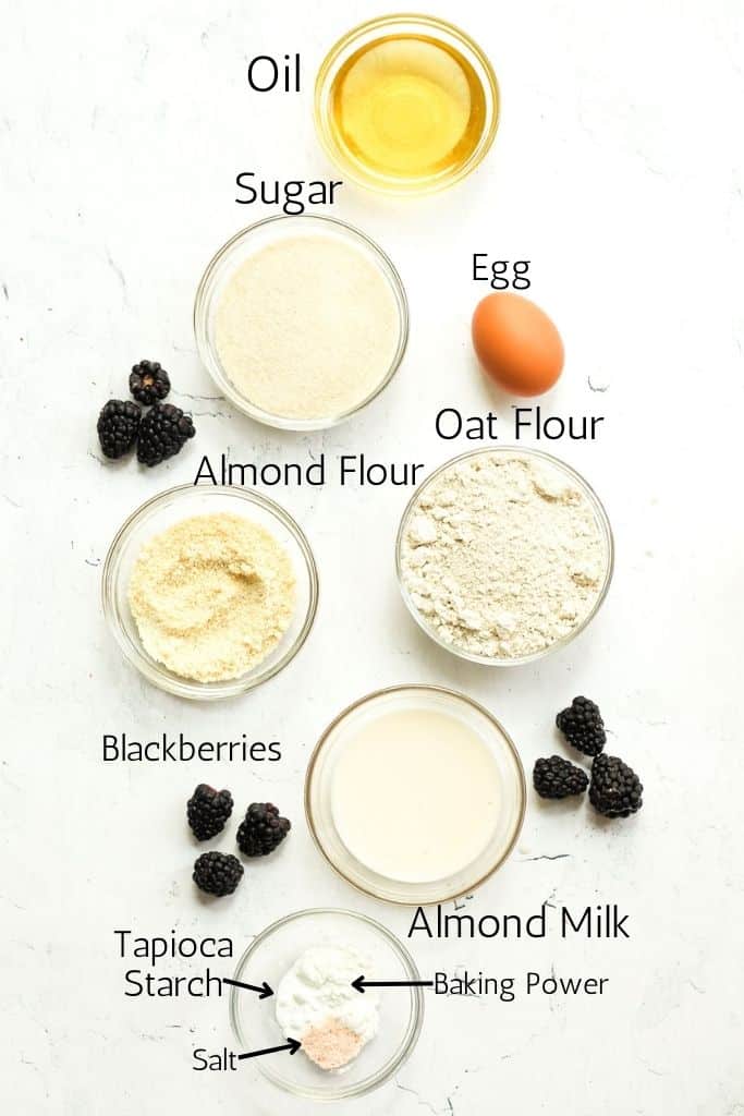 ingredients for gluten free blackberry muffins labeled with black text.