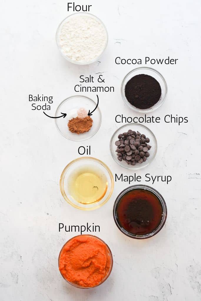 ingredients for vegan pumpkin brownies labeled with black text.