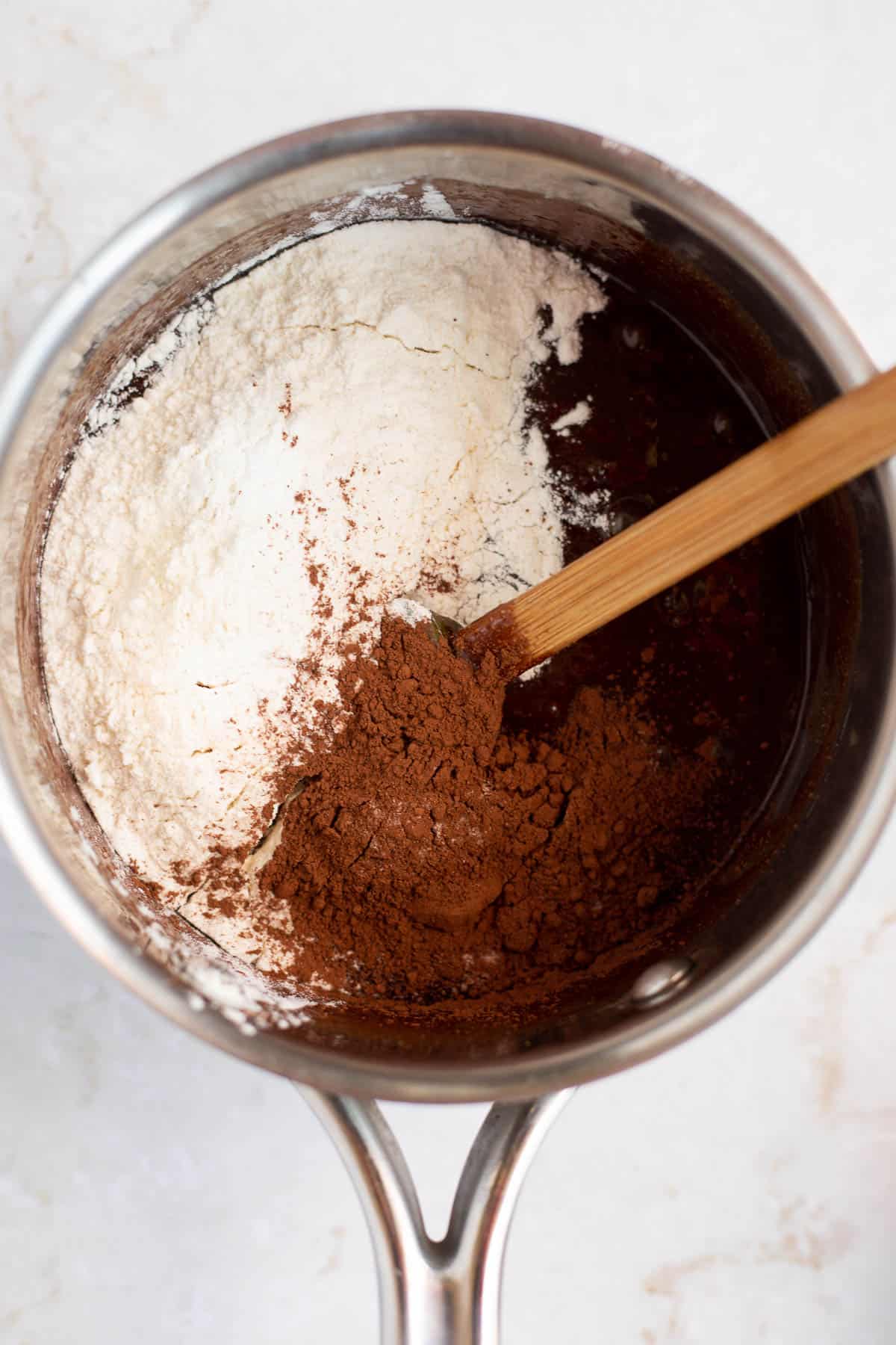 flour and cocoa powder in a pot.