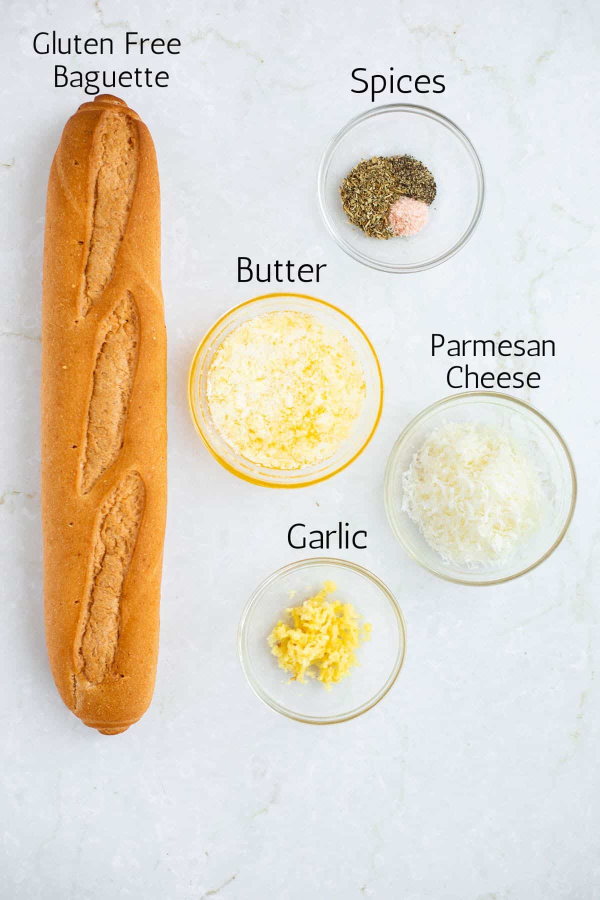 ingredients for gluten free garlic bread labeled with black text.
