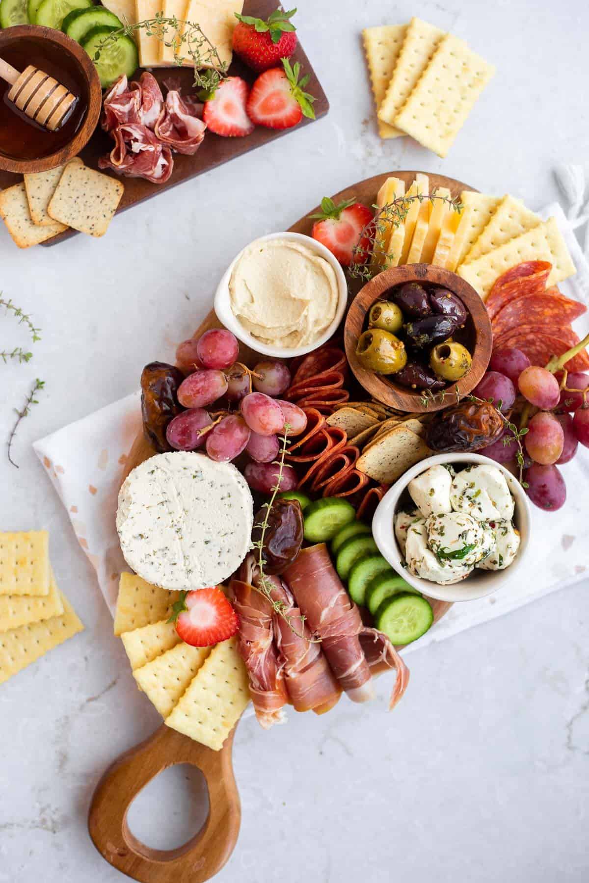 Small Charcuterie board on a white backdrop.