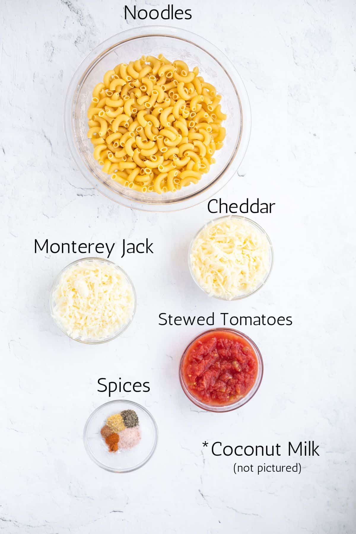 ingredients for mac and cheese without milk labeled with black text.