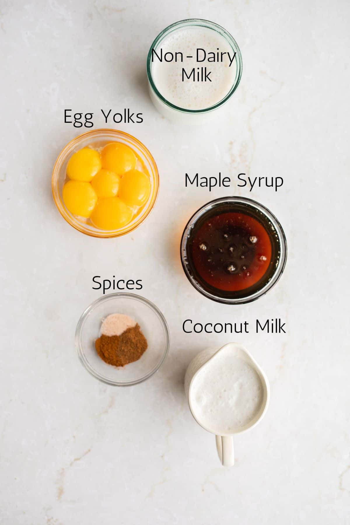 ingredients for dairy free eggnog labeled with black text.