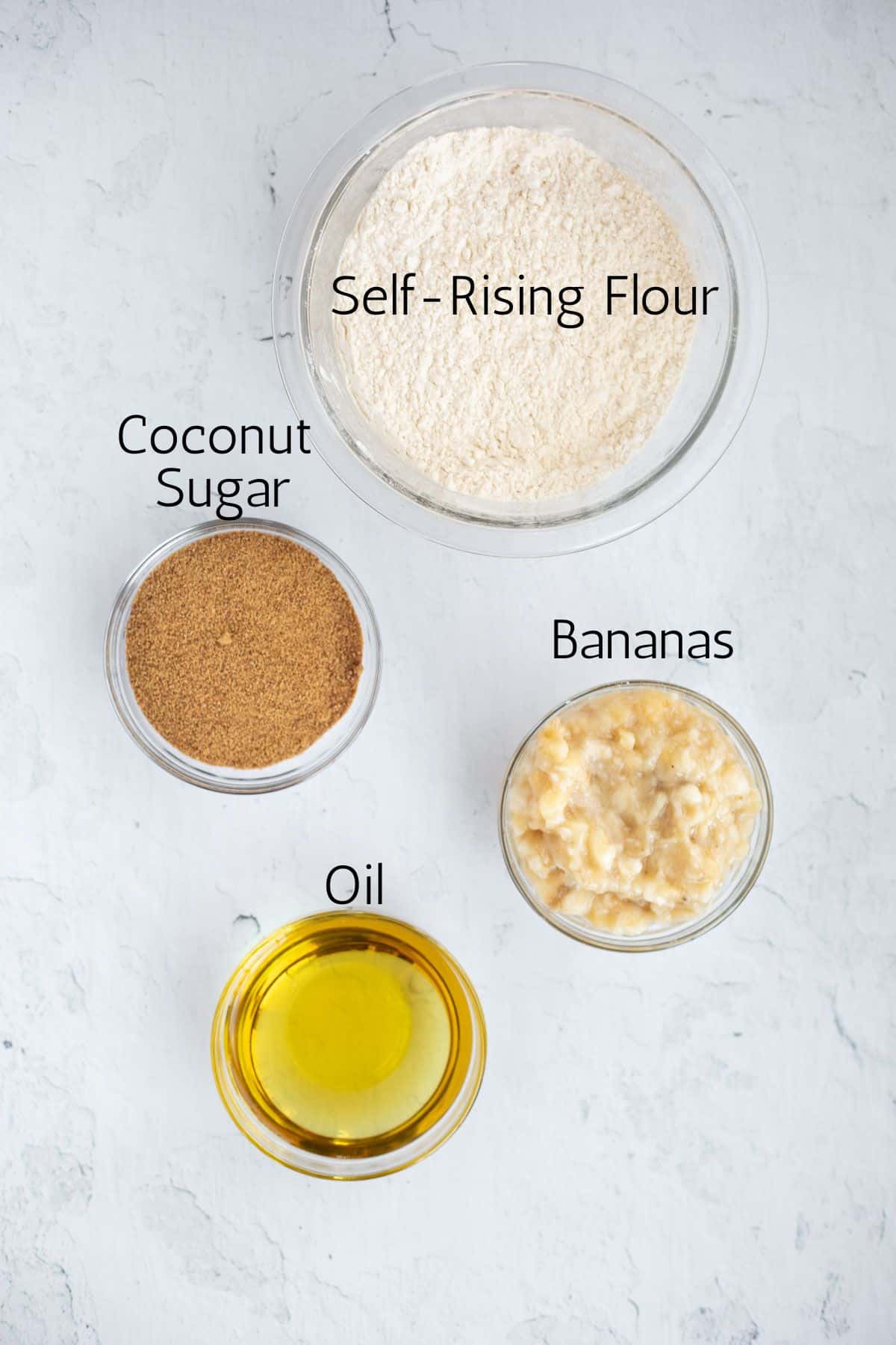 ingredients for 4 ingredient banana bread labeled with black text.