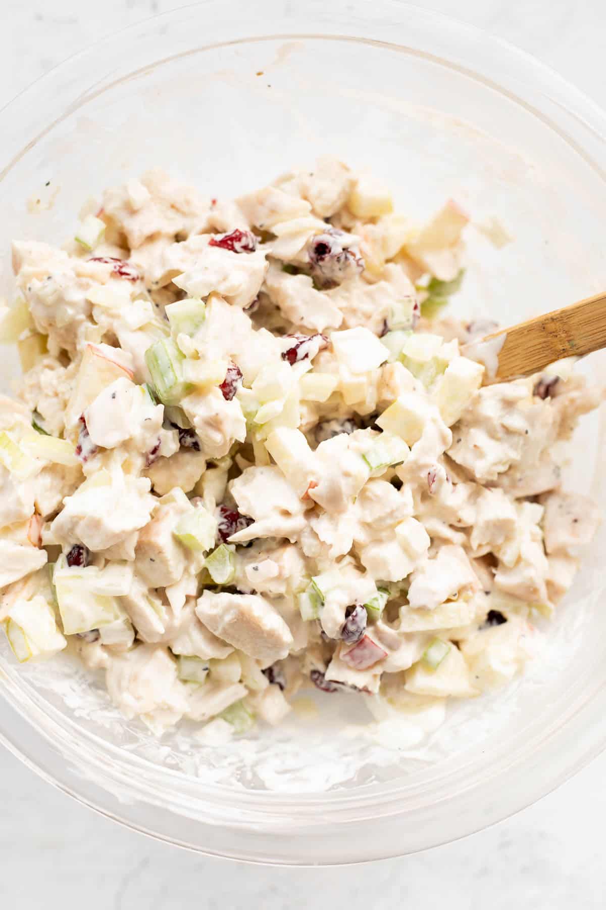 cranberry chicken salad in a glass bowl.