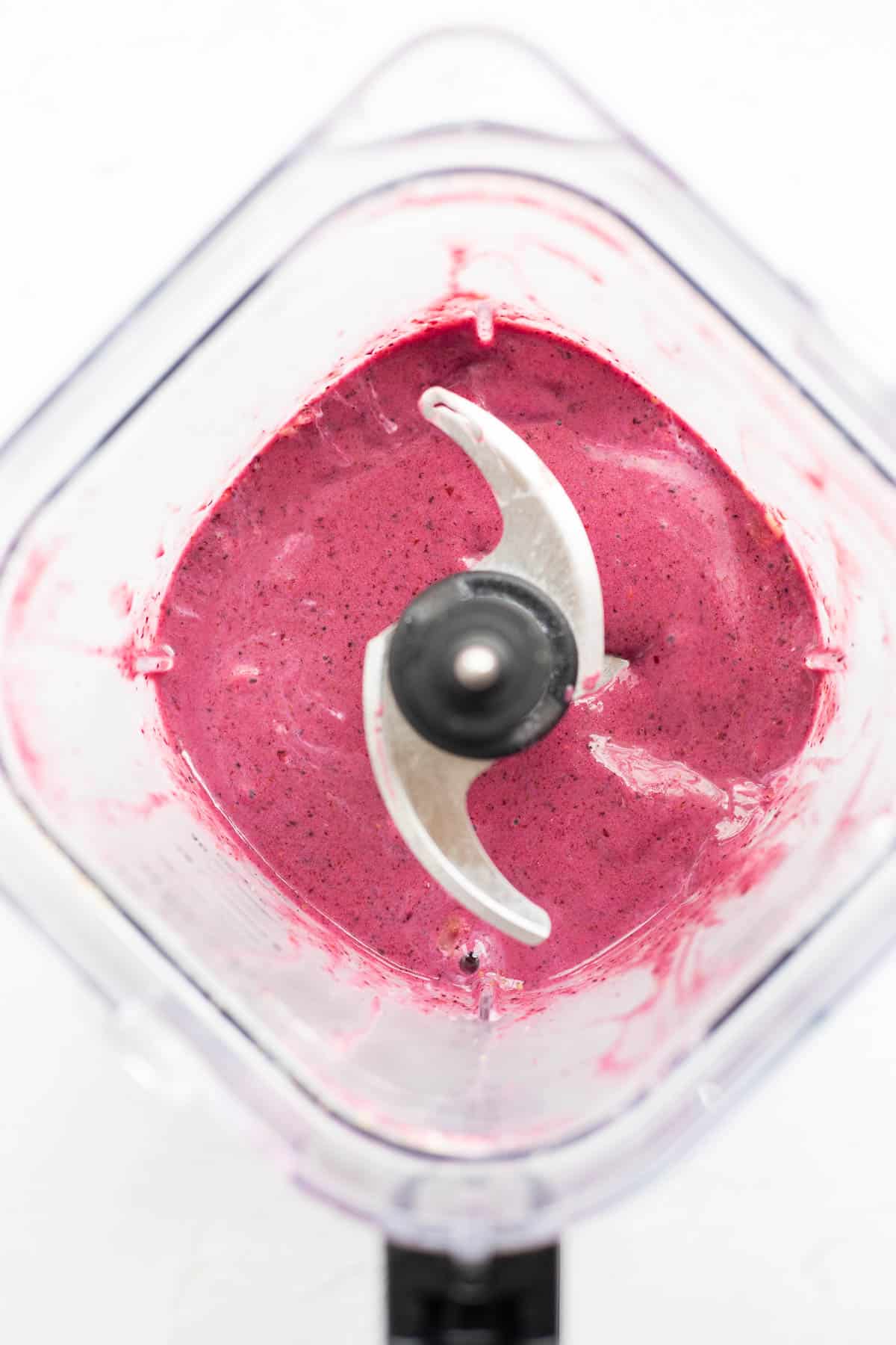 mixed berry yogurt smoothie in a blender.