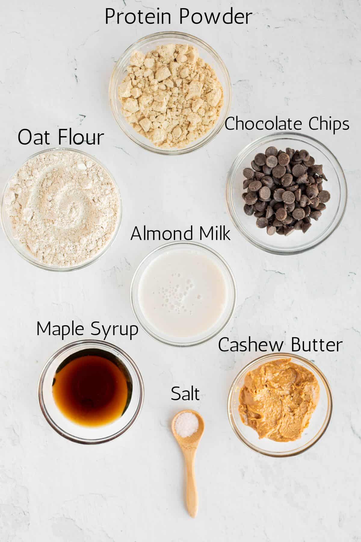 ingredients for protein cookie dough labeled with black text.