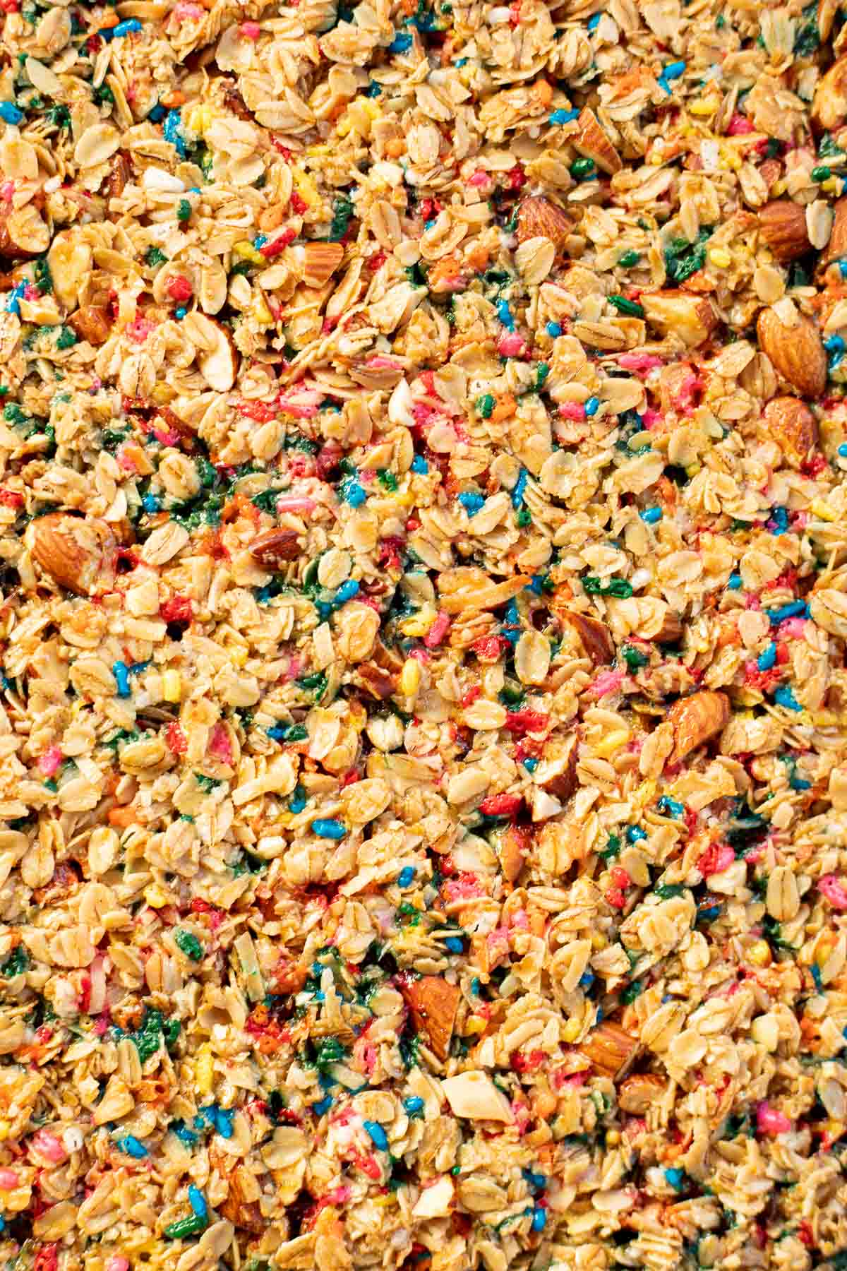 zoomed in photo of baked granola with sprinkles.