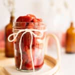 healthy compote in a glass jar with a ribbon.