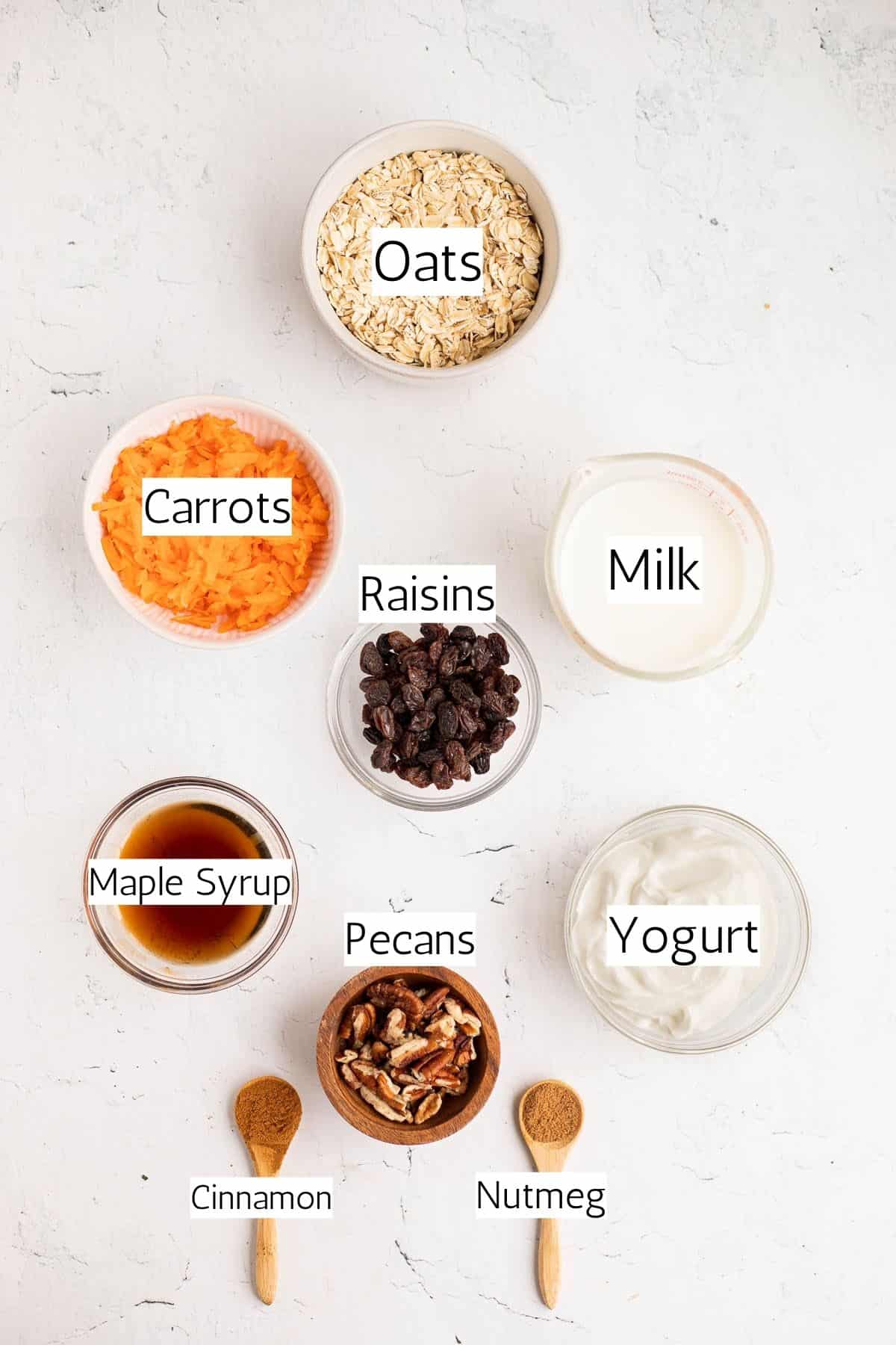 ingredients for carrot cake overnight oats labeled with black text.