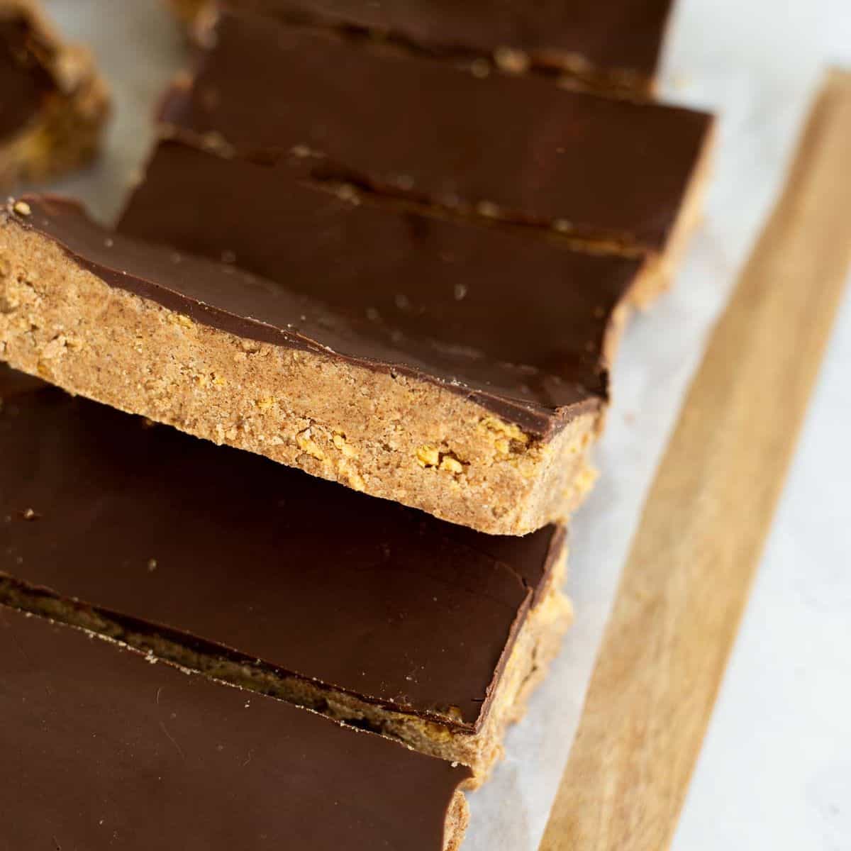gluten free protein bars cut into rectangles on parchment paper.