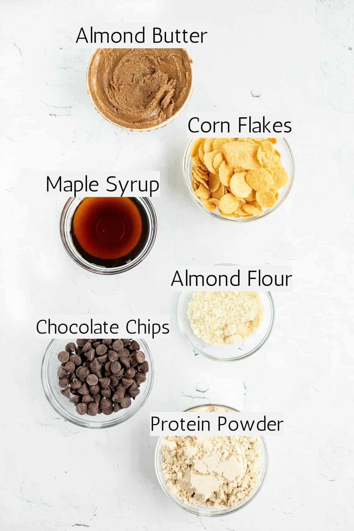 ingredients to make homemade protein bars labeled with black text.