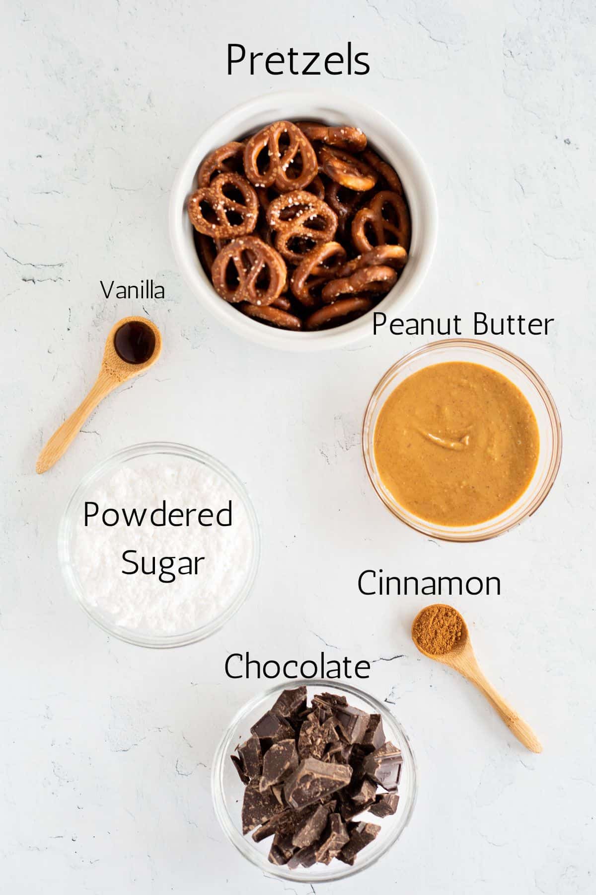ingredients to make peanut butter pretzel bites labeled with black text.