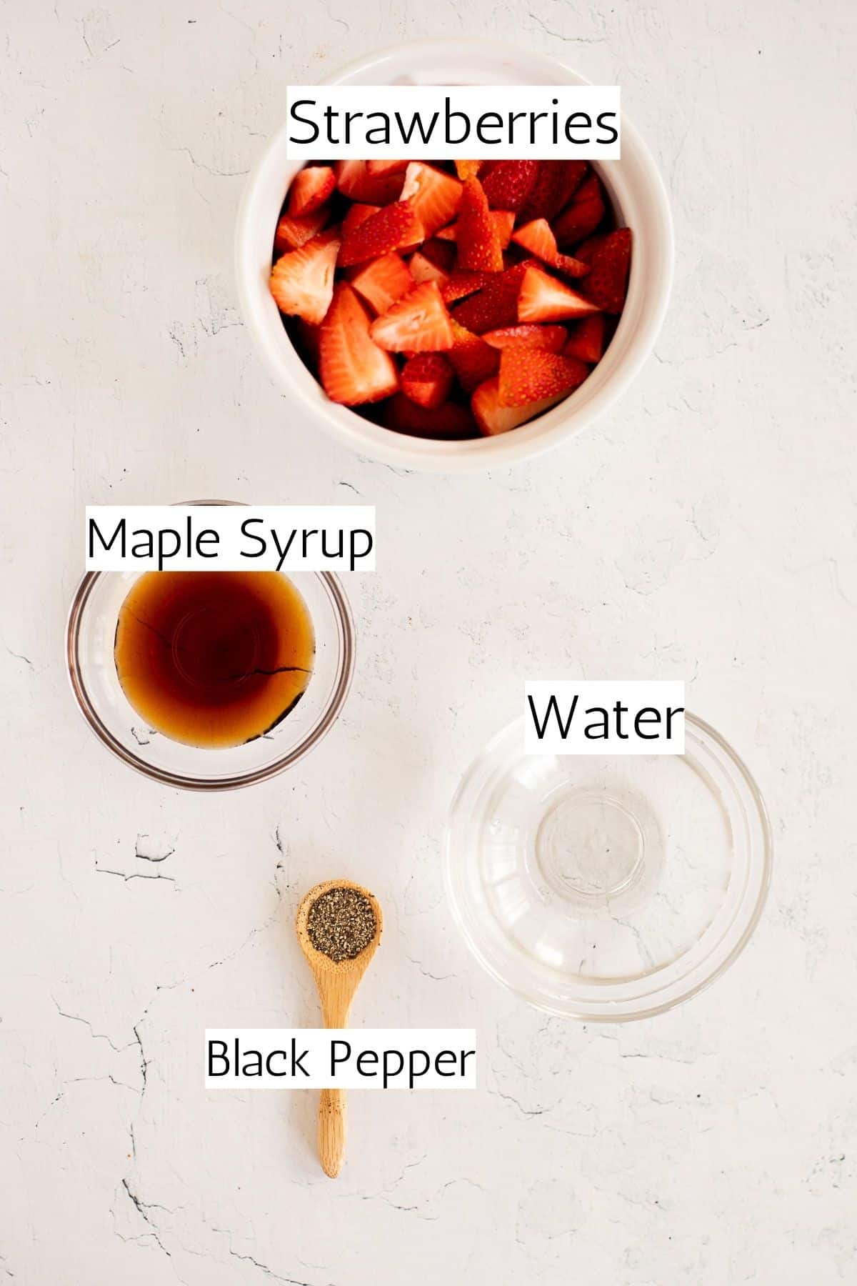 ingredients for strawberry compote labeled with black text.