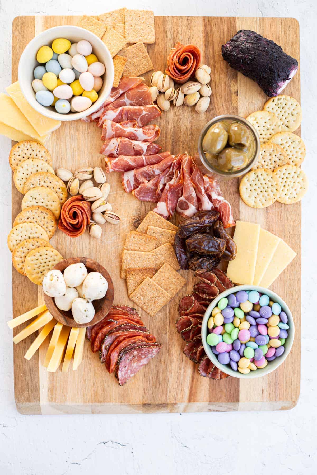 crackers, dry goods, meats, and cheeses to make a charcuterie board.