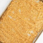 golden brown gluten free bread crumbs on a baking sheet.