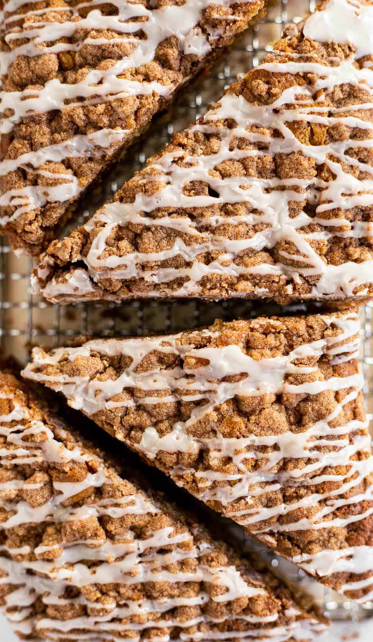close up of the crumb topping on a mini coffee cake with a glaze.