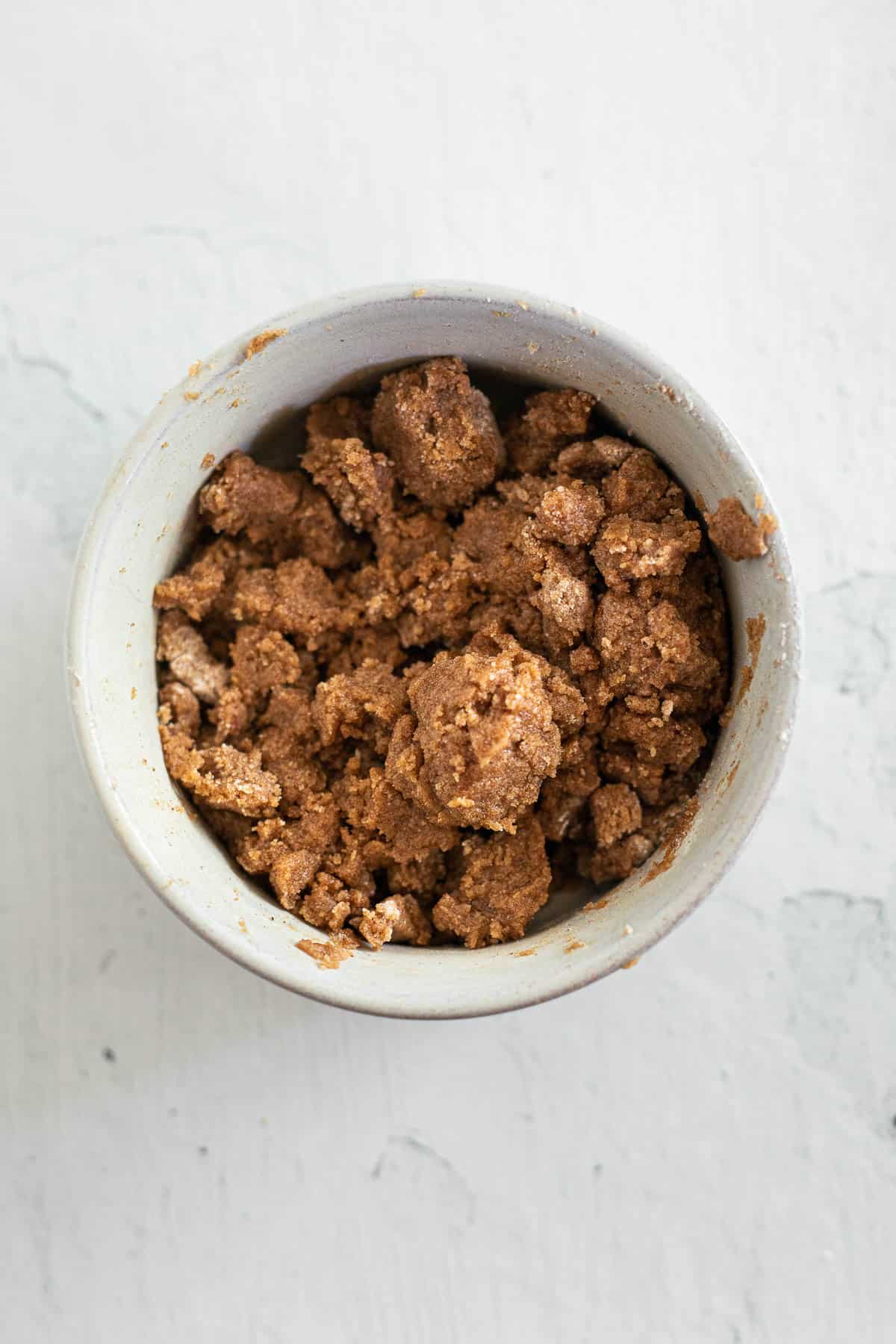 gluten free crumb topping in a small white bowl.