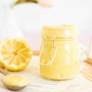 small batch of lemon curd in a glass jar.