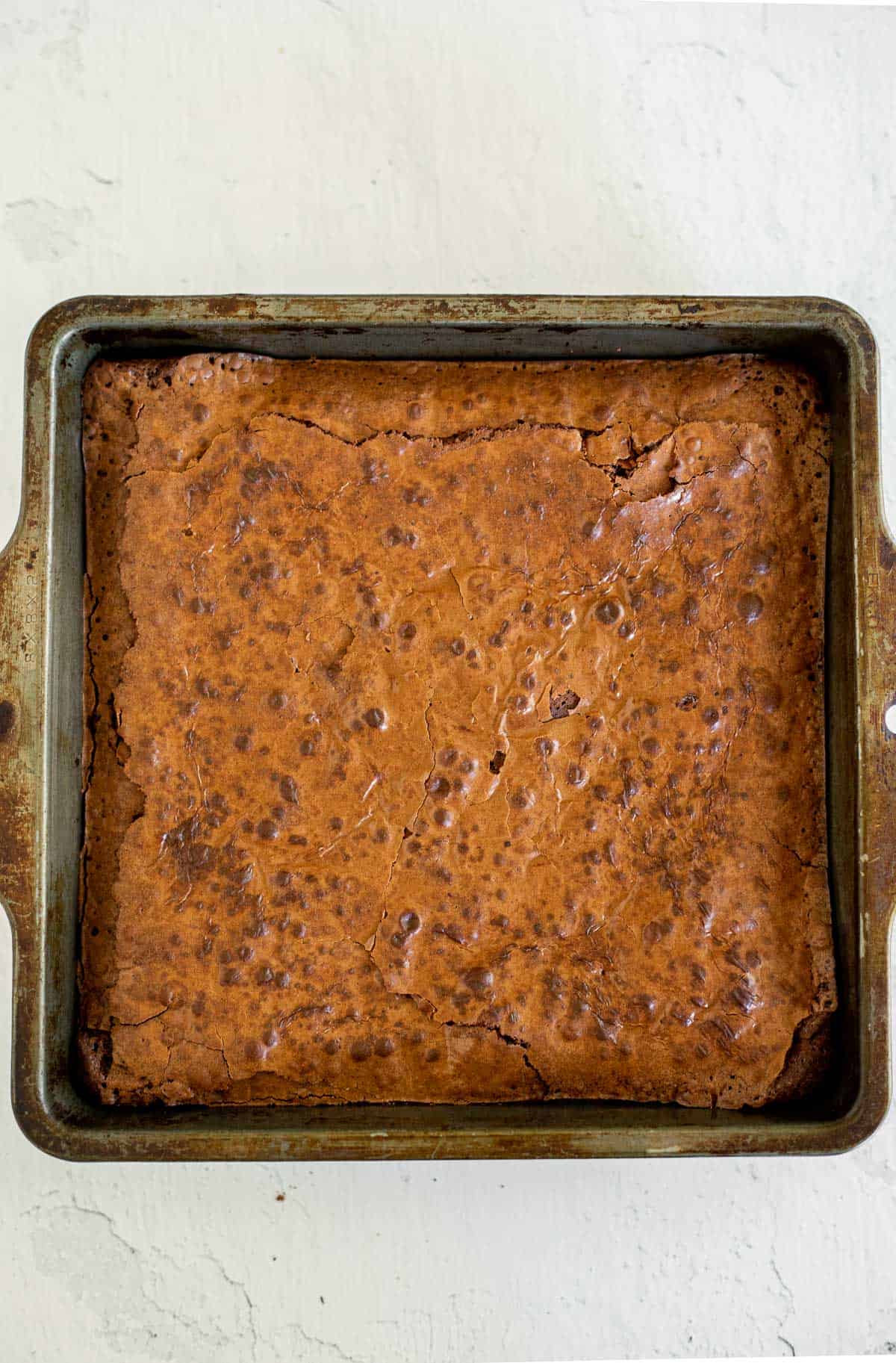 baked black forest brownies in a metal baking pan.