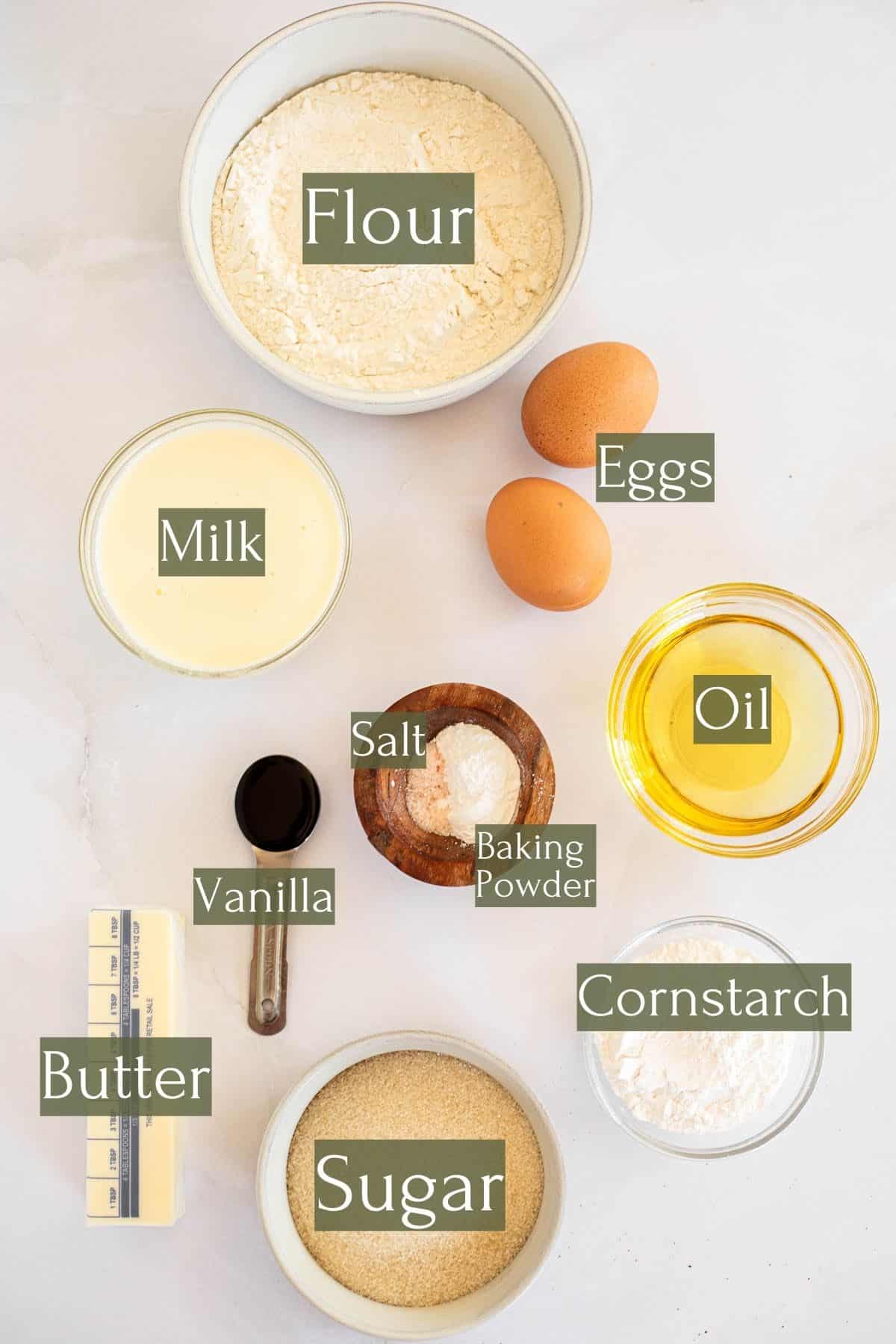 ingredients to make the best vanilla cupcakes labeled with green text boxes.