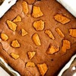 overhead photo of Biscoff brownies in a metal baking pan.