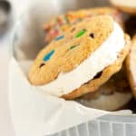 homemade ice cream sandwich with M&Ms on a tin.