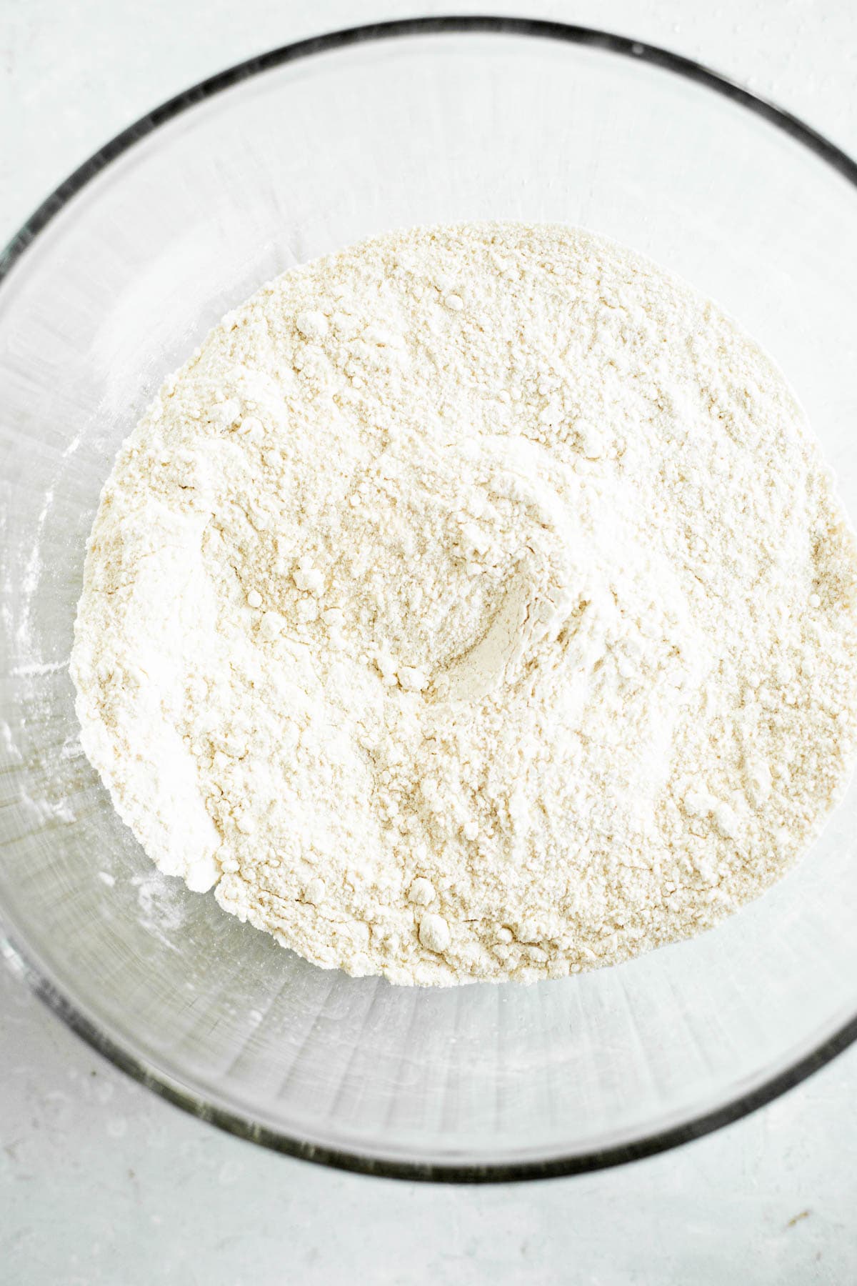 whisked flour and sugar in a glass bowl.