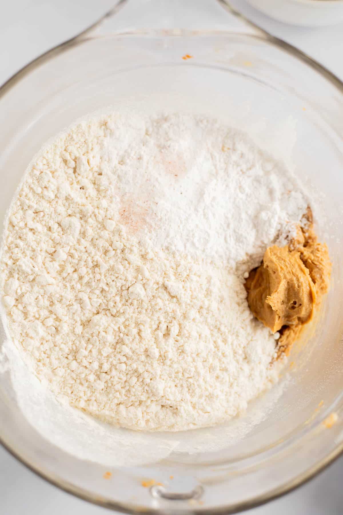 flour, baking soda, and salt in a glass bowl.