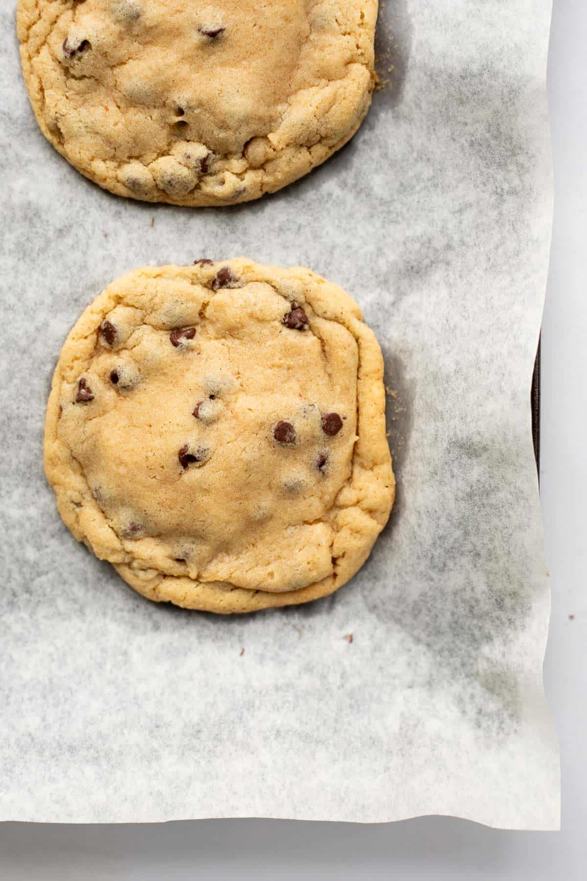 overhead photo of chocolate chip cookie with mini chocolate chips.