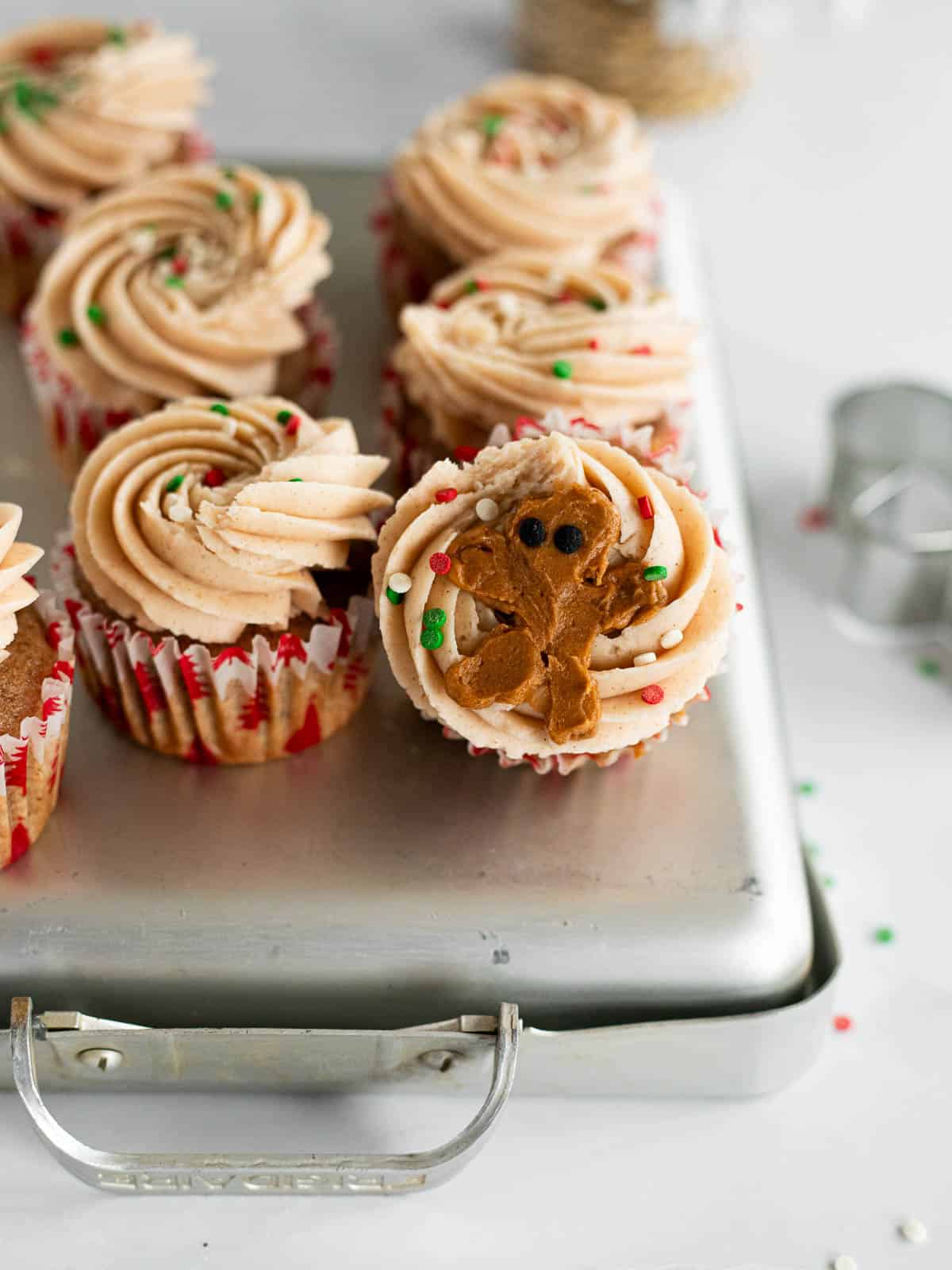 Gluten Free Gingerbread Cupcakes decorated with gingerbread man frosting.