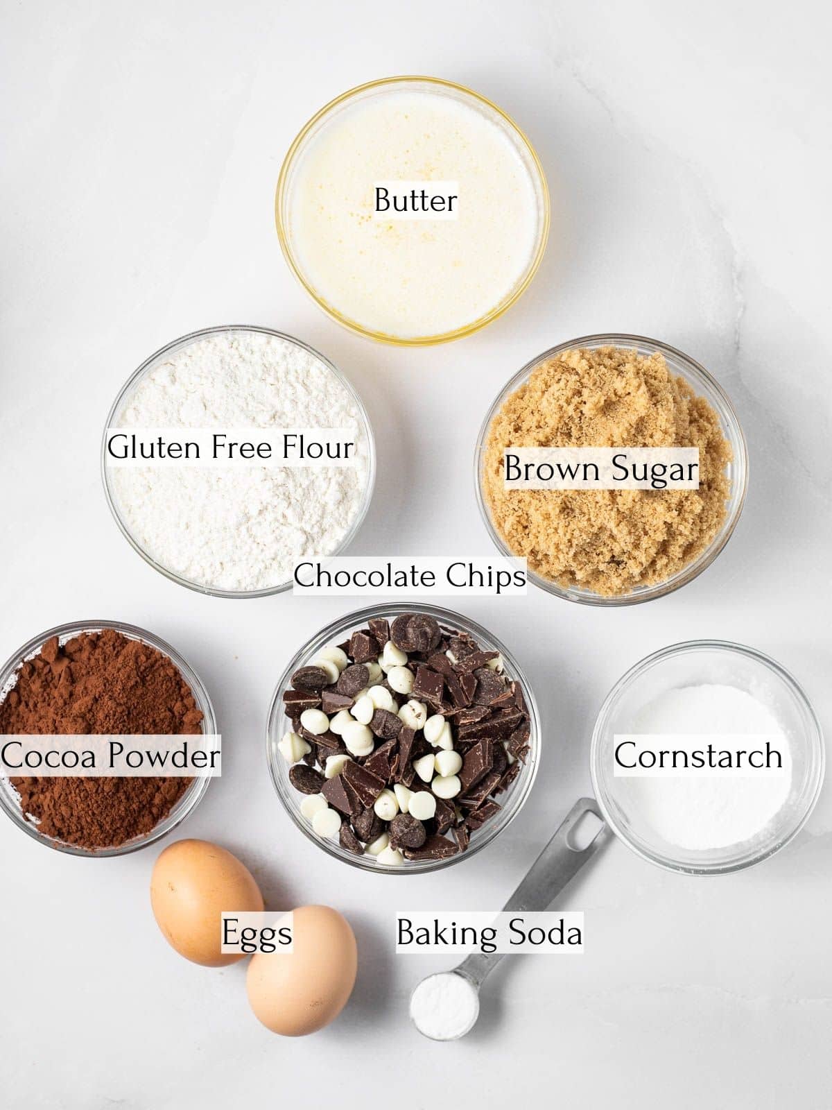 ingredients to make triple chocolate gluten free cookies labeled with white text.