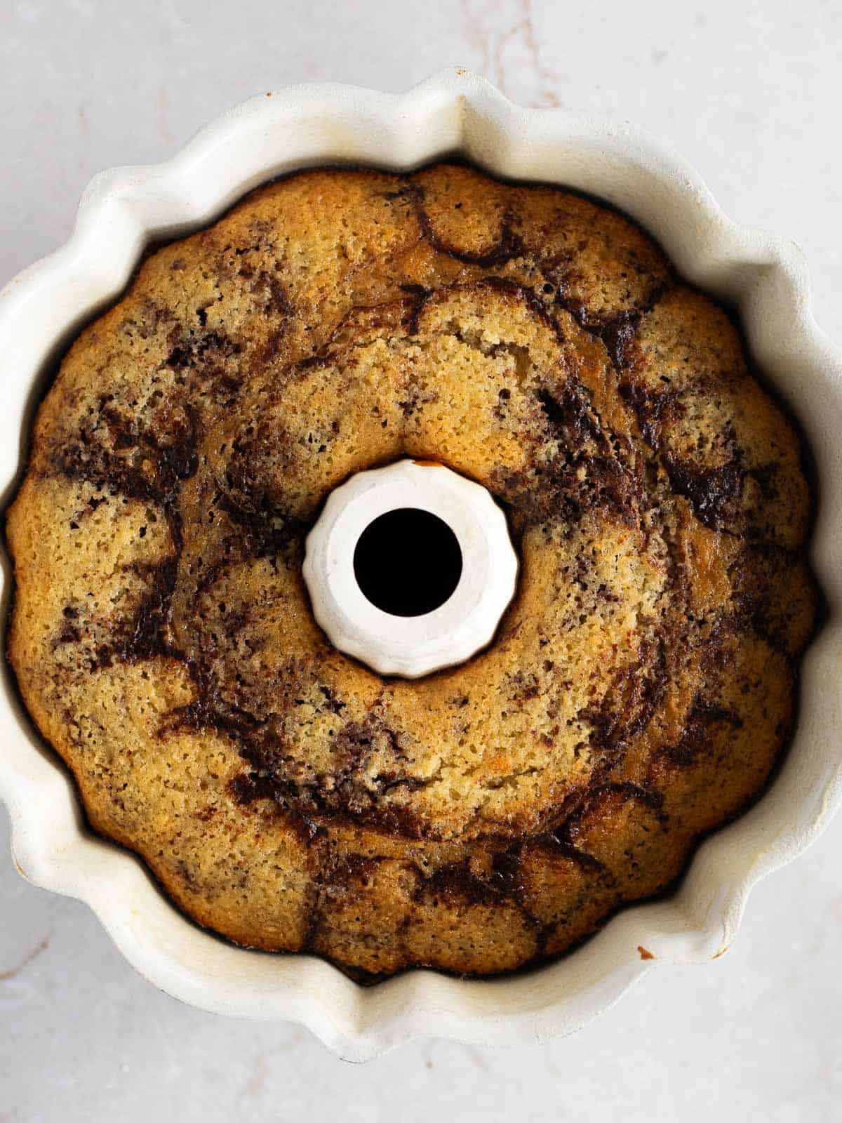 Baked buttermilk marble bundt cake in the pan.